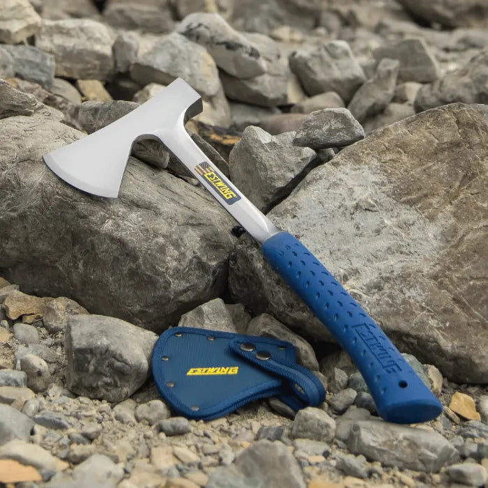 estwing camping axe with blue handle on rocks