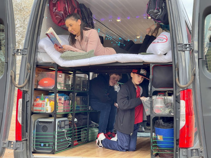 camper van conversion shelving with bed, rear