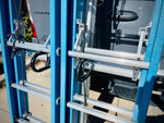 cargo trailer drop down ladder rack, triple, 2 ladders mounted, close view
