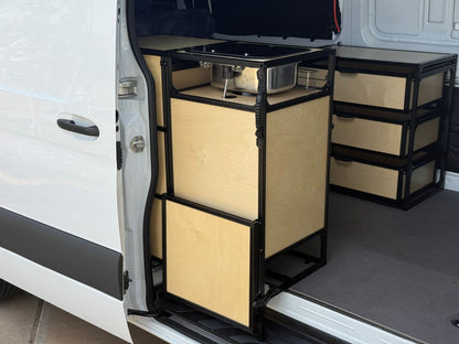 camper van sink in passenger sliding door with flip up table folded down
