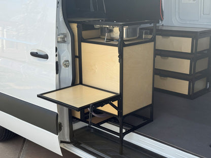 flip up table on the back of a sink system in pass door of camper van