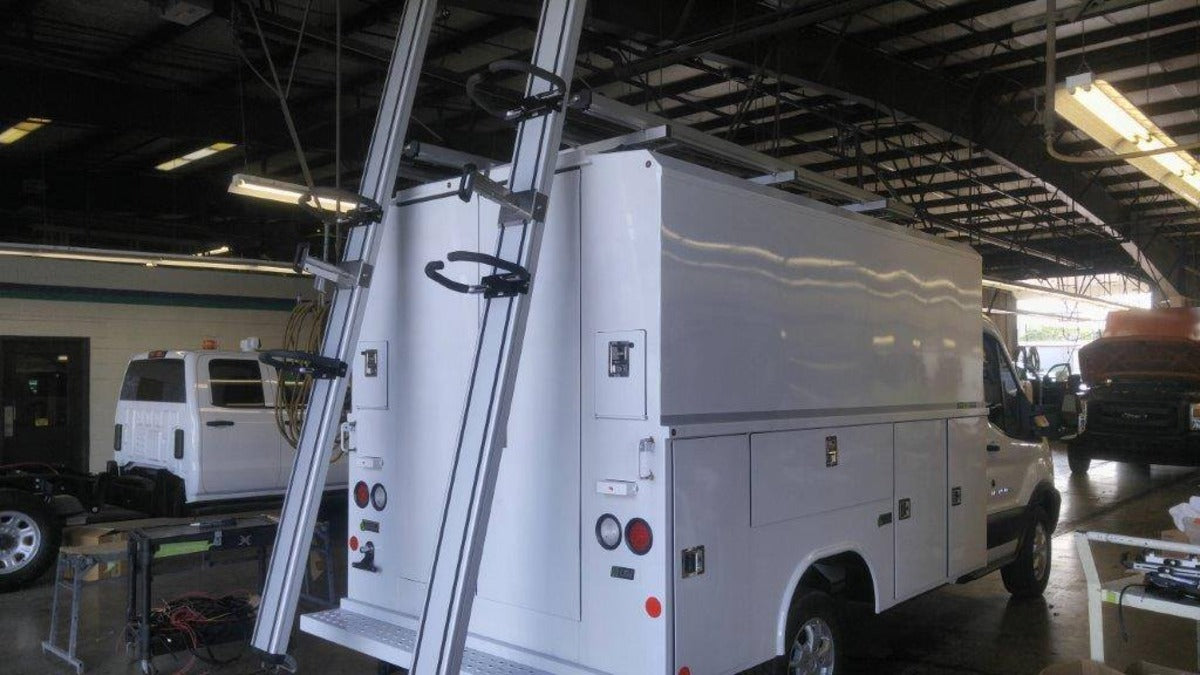 cargo trailer drop down ladder rack