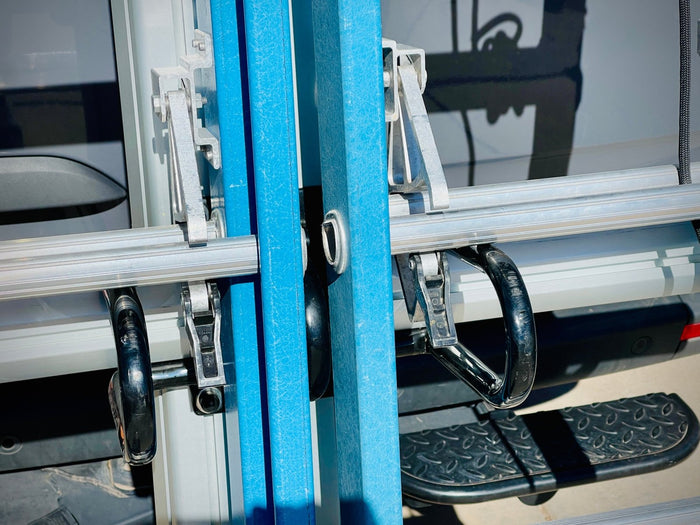 two werner ladders on a drop down ladder rack, close up