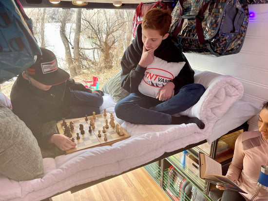 playing chess on a camper van diy bed kit for van life conversion