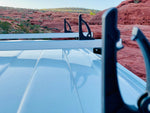 van roof rack with 3 crossbars and sliding L-stops
