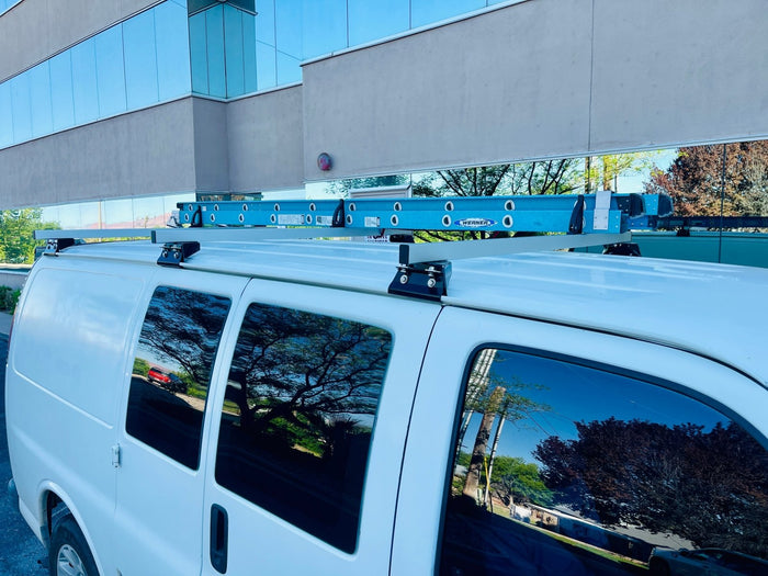 van roof rack with 3 crossbar with werner ladder mounted on chevy express