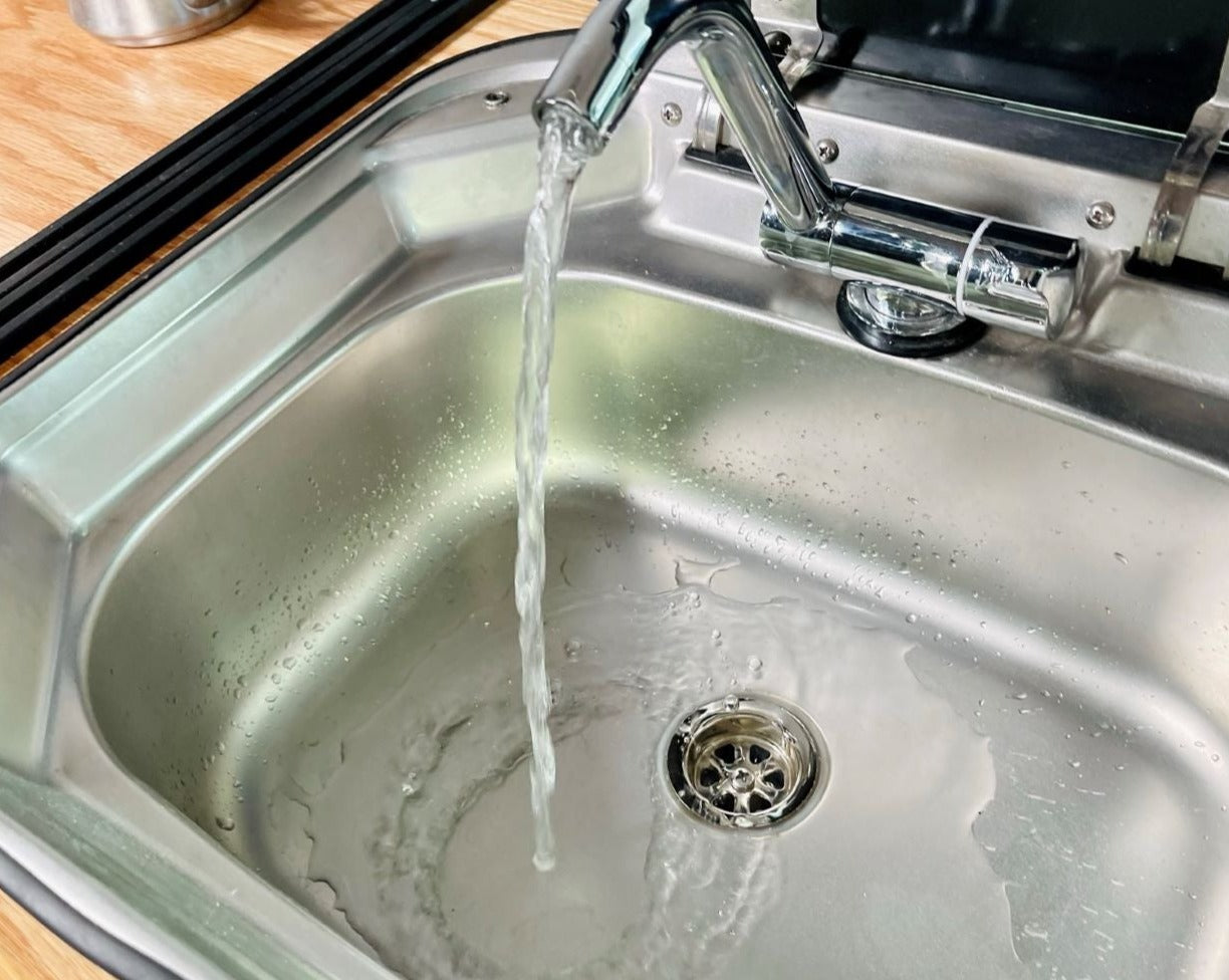Mercedes Sprinter 144 Camper Van Conversion Kit DIY Kitchen sink pumping water into sink - Front