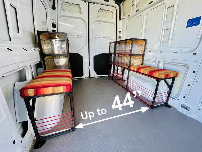Van wheel well bench with aisle space open for motos and bicycles for van conversion.