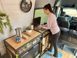 camper van kitchen unit with self contained sink system washing hands