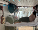 laying on van diy bed kit from TNTvans for camper van conversion