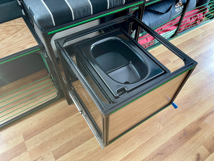 boxio compositing toilet inside TNTvans van toilet slide for DIY camper van conversion